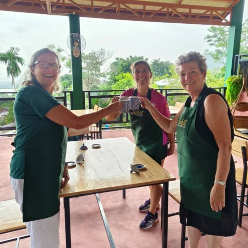 Family enjoying a private Thai cooking class at Bukit Thai Cooking Class in Phuket.
